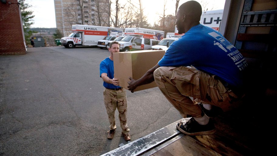 DIY men loading moving boxes